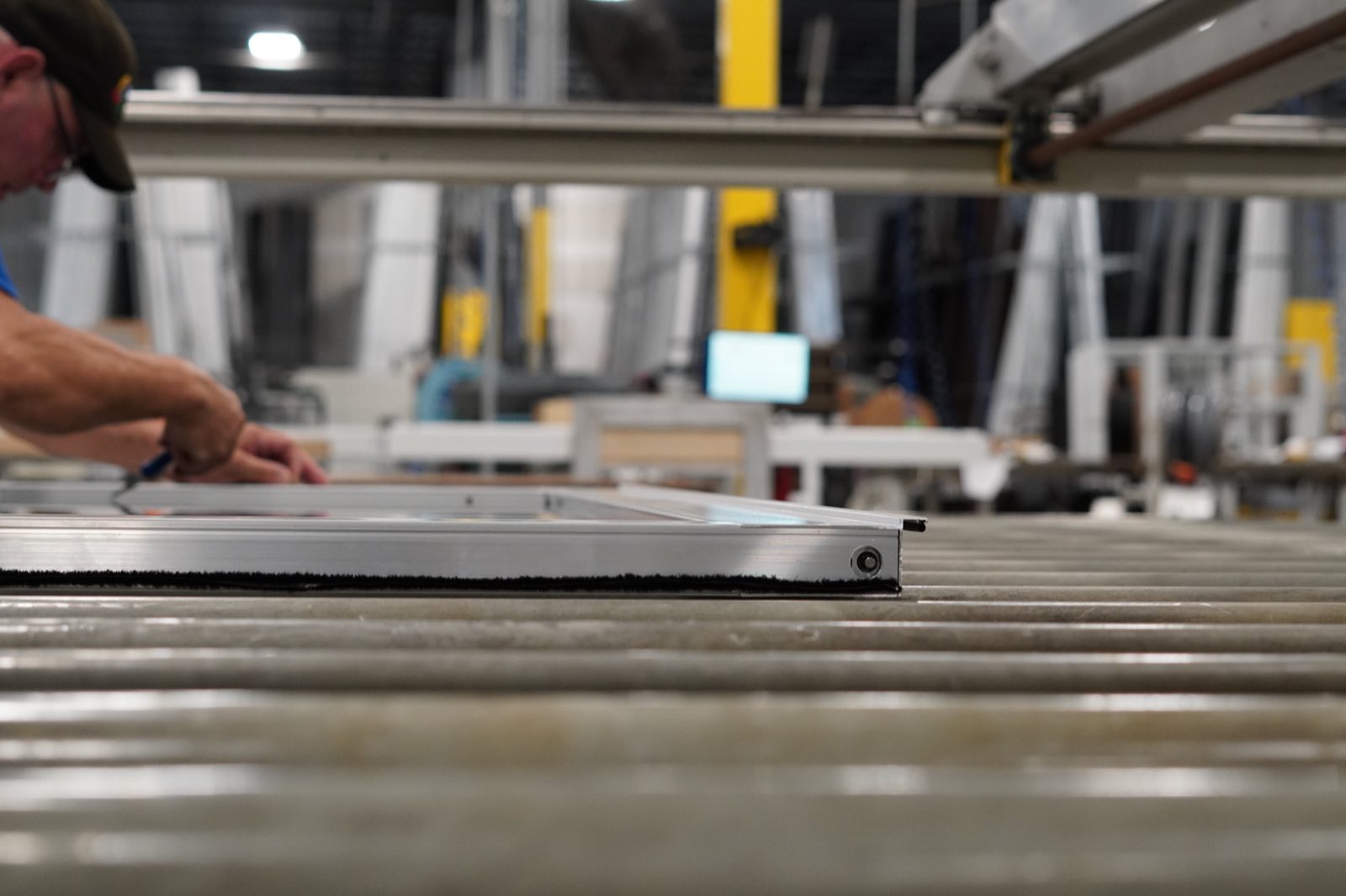 Impact window frame being assembled on the shop floor