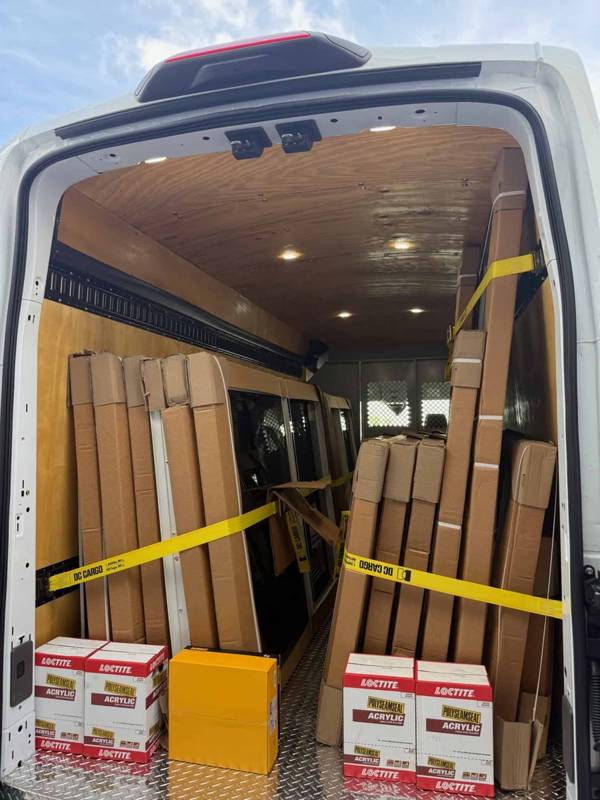 ATC van loaded with impact windows heading to a job