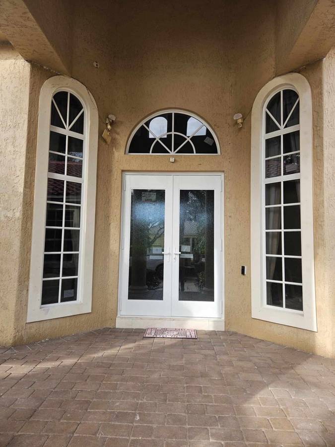 French doors with arched windows
